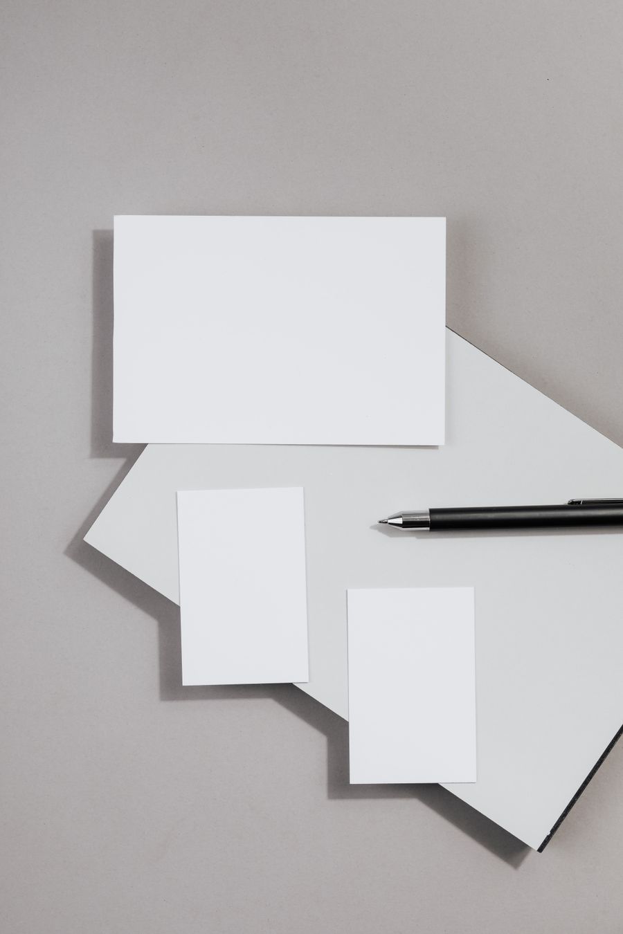 Neatly arranged business cards displayed on a surface