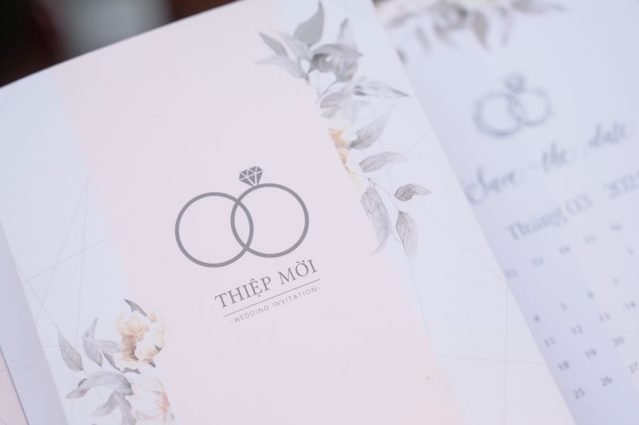 Elegant wedding invitations with decorative printing and envelope